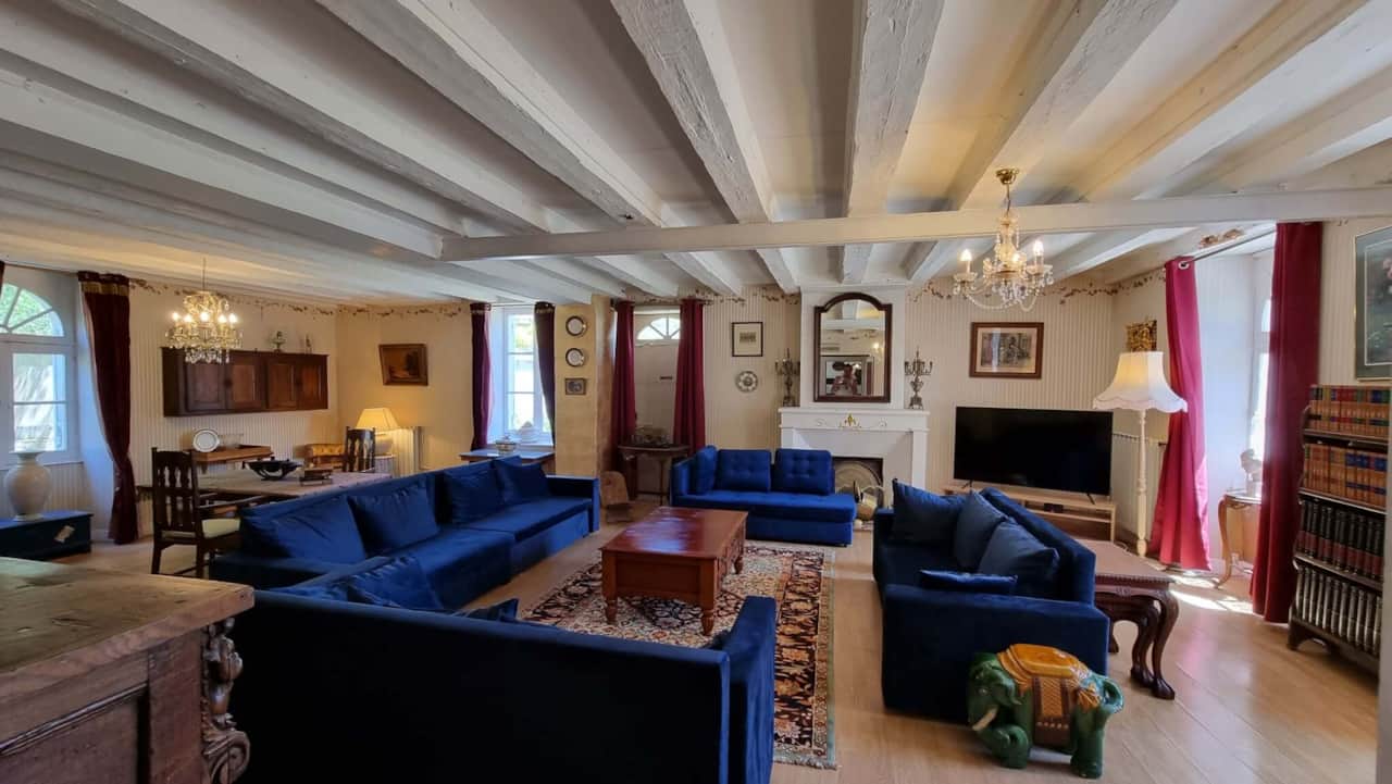 Spacious and bright living room with comfortable sofas