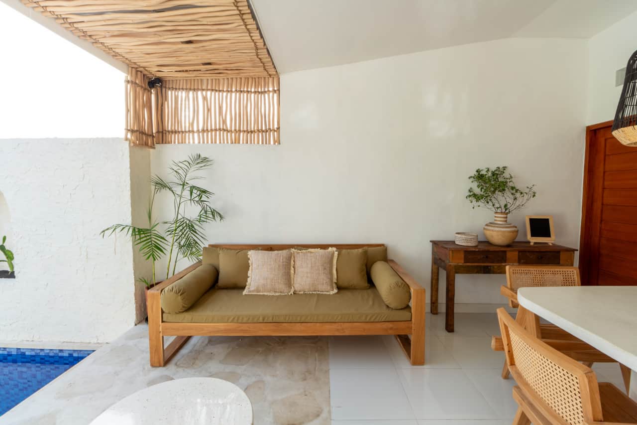 A cozy lounging sofa that provides the perfect spot to indulge in a relaxing and laid-back day.