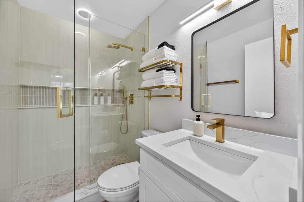 Full bathroom with walk in shower attached to the primary bedroom.