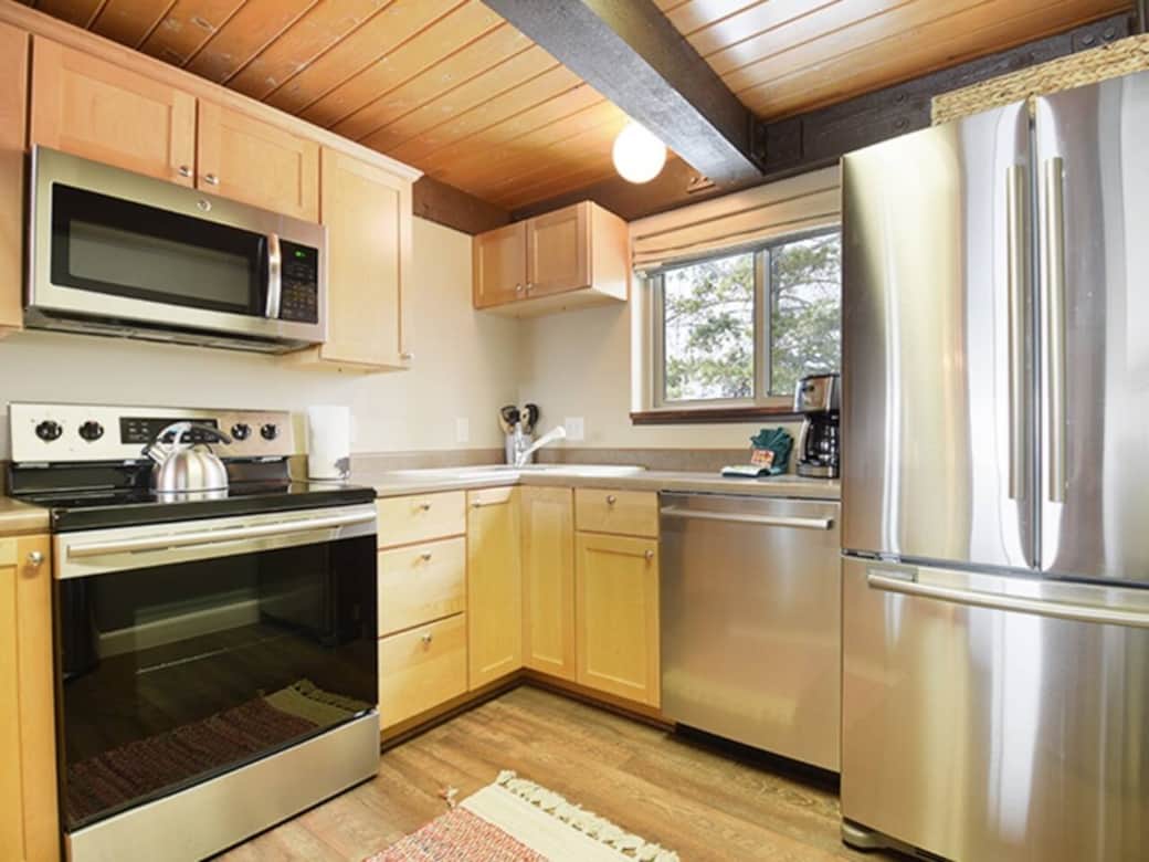 Our open-concept kitchen is fully stocked with everything you need for a home-cooked family meal—from pots and pans to a crockpot, blender, spice rack, and kid-friendly essentials. Our open-concept kitchen is fully stocked with everything you need for a home-cooked family meal—from pots and pans to a crockpot, blender, spice rack, and kid-friendly essentials.