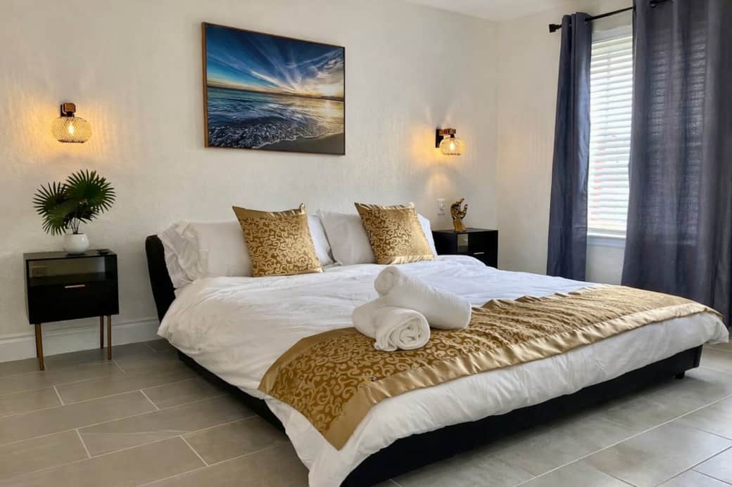 Master bedroom suite with king bed and private bathroom Master bedroom suite with king bed and private bathroom