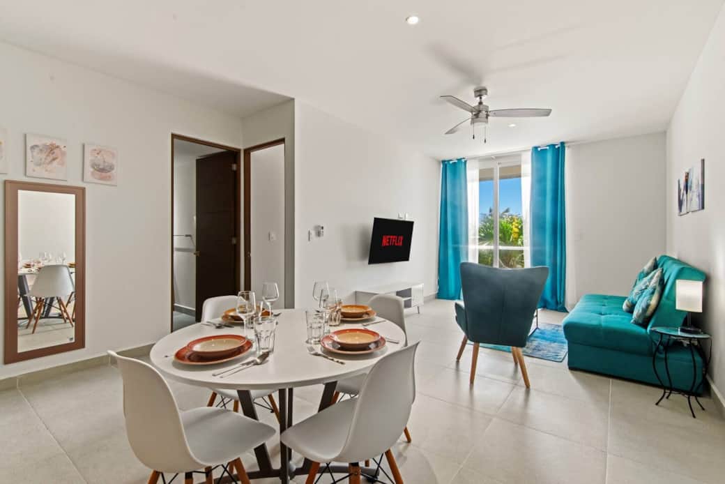 Gather around the dining table for 4, complete with dinnerware, glassware, and silverware for shared meals together. Enjoy relaxing greenery views from the dining area or stream your favorite shows and movies on the Smart TV while dining.