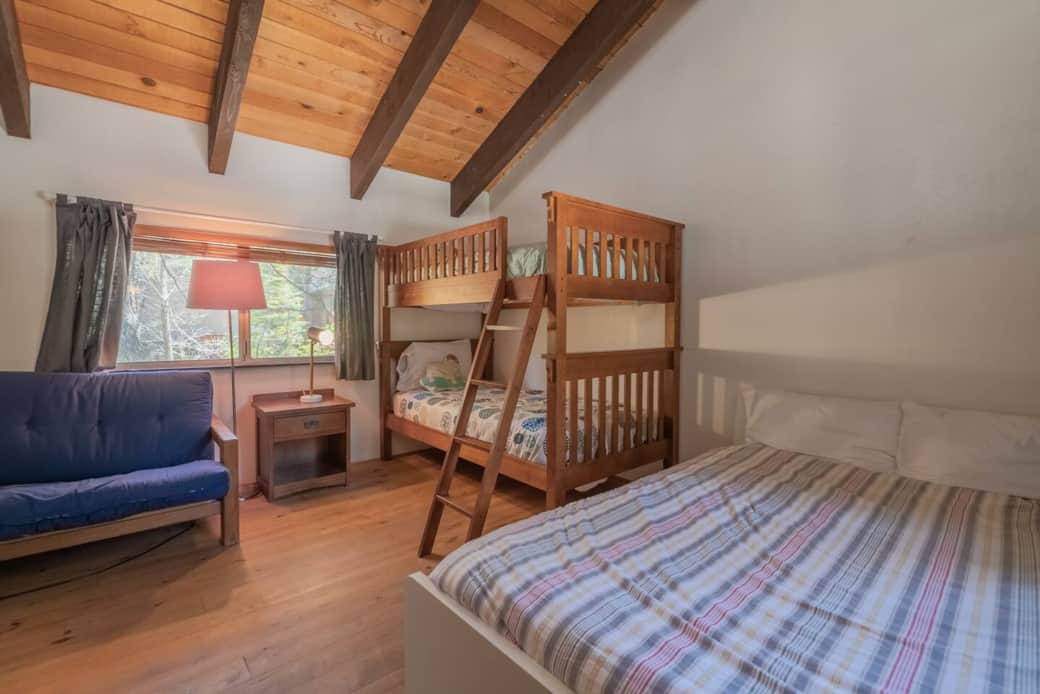 Upstairs bedroom #4 with twin bunks and queen bed