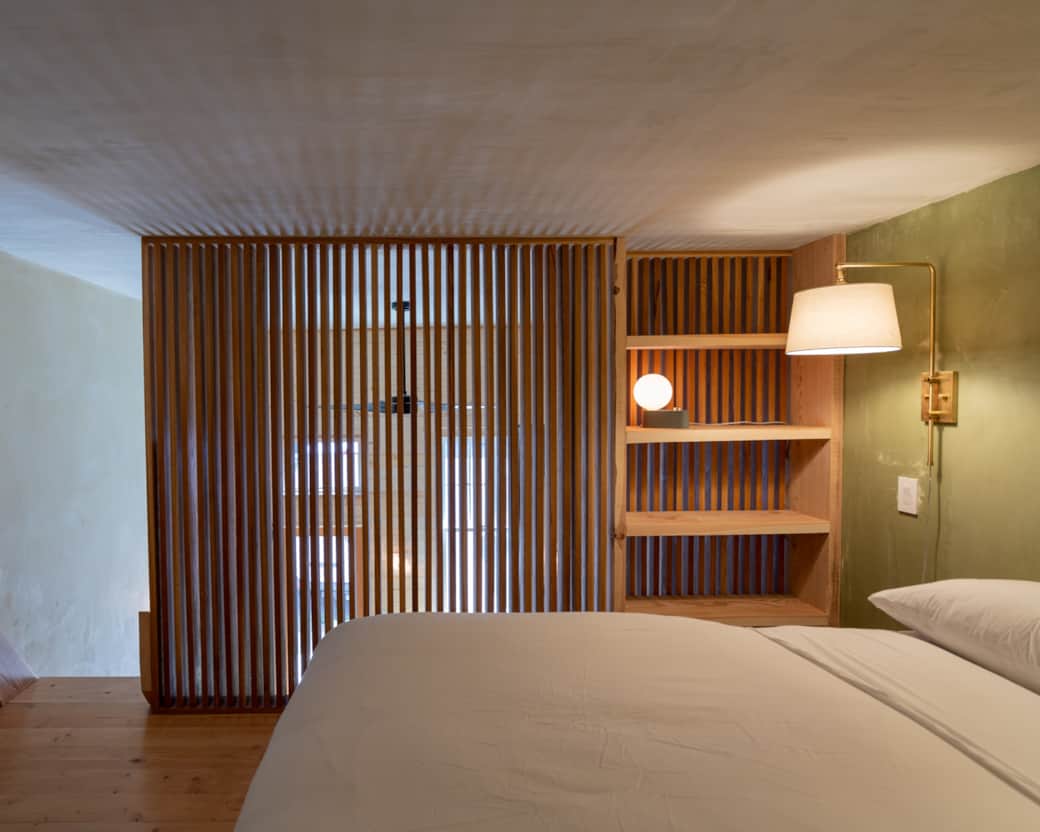 The hand built oak privacy screen in the loft