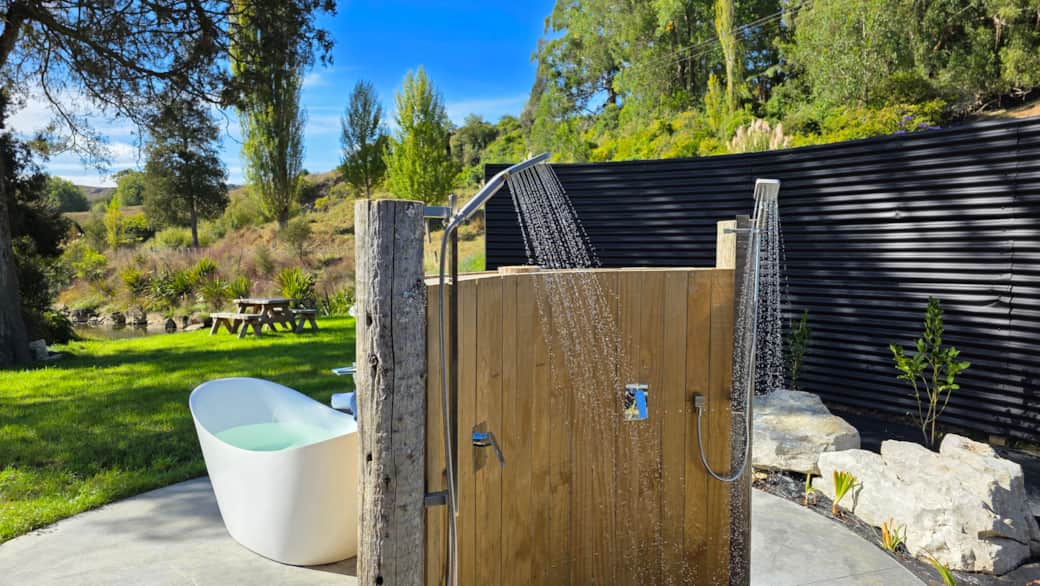 Outdoor bath and double rain showers at Cascade Cabin Ripples Retreat Waitomo Outdoor bath and double rain showers at Cascade Cabin Ripples Retreat Waitomo