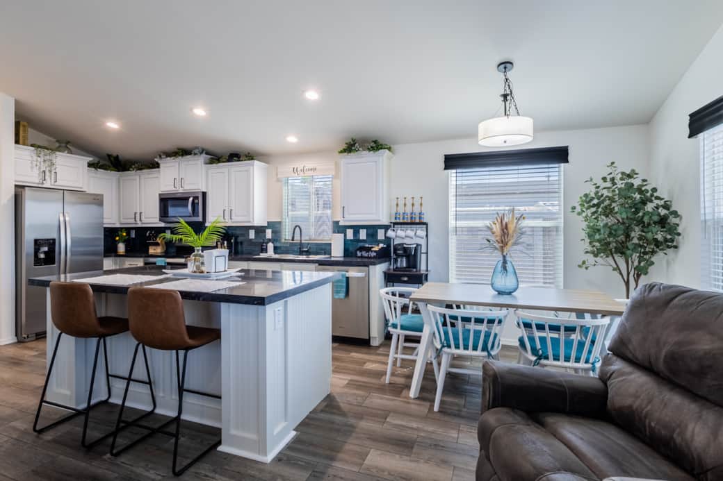 Bright, open kitchen—book now to enjoy meals & memories together.