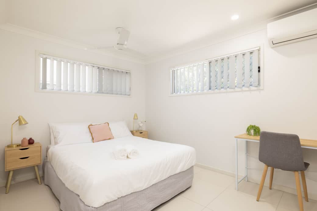 Bedroom: Peaceful bedroom with cozy design and ample storage 