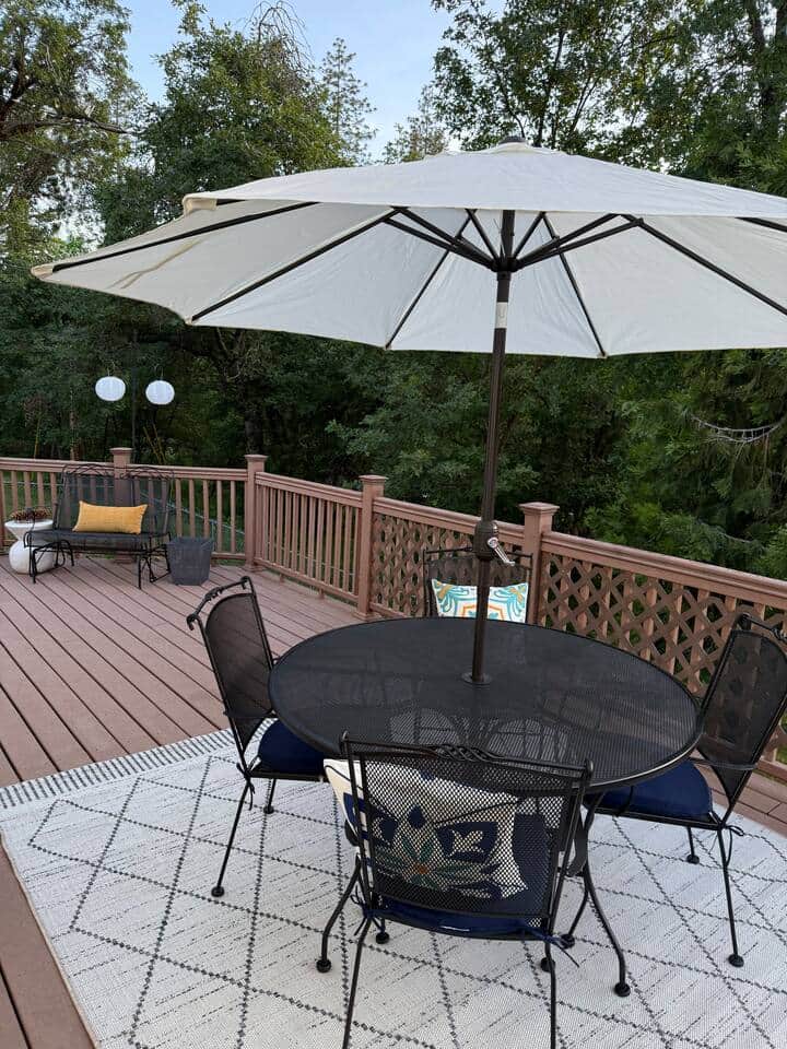 Spacious deck includes high end BBQ, large round tables, smaller square table, 6 chairs, and a rocking bench for lounging. The large deck overlooks the trees and is ideal for watching local wildlife passing by. Spacious deck includes high end BBQ, large round tables, smaller square table, 6 chairs, and a rocking bench for lounging. The large deck overlooks the trees and is ideal for watching local wildlife passing by.