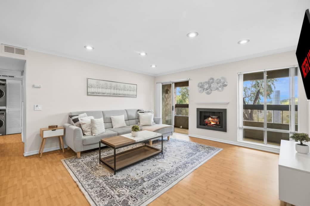 Living Area - Fireplace, Smart TV , Access to Private Balcony