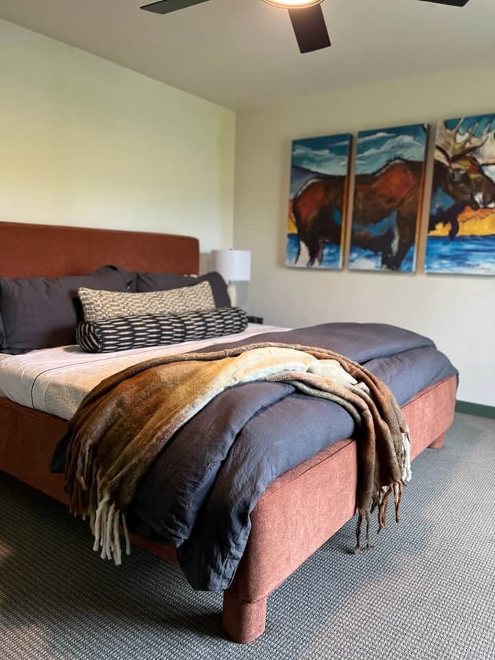 Guest room art and bed