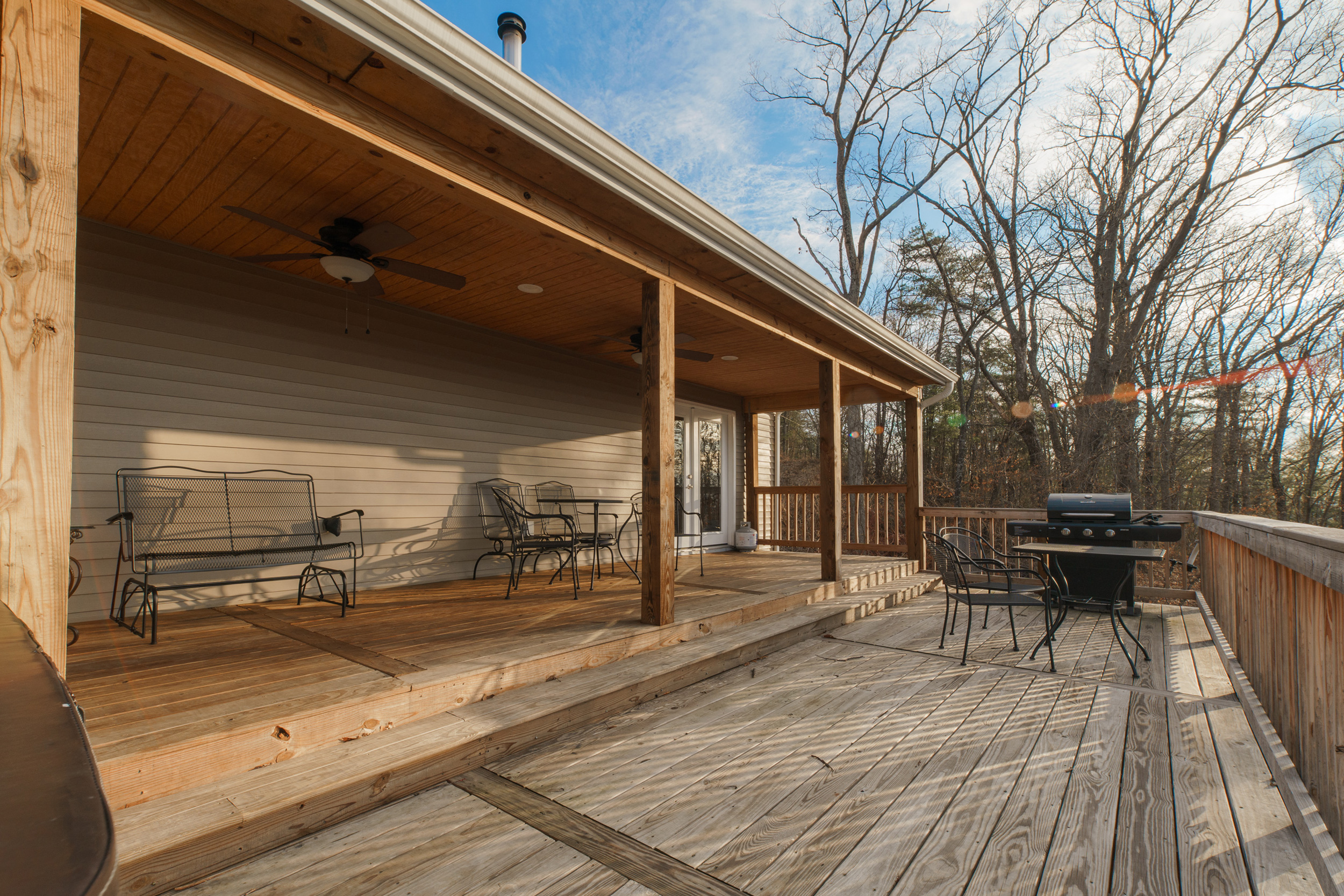 deck includes furniture and grill