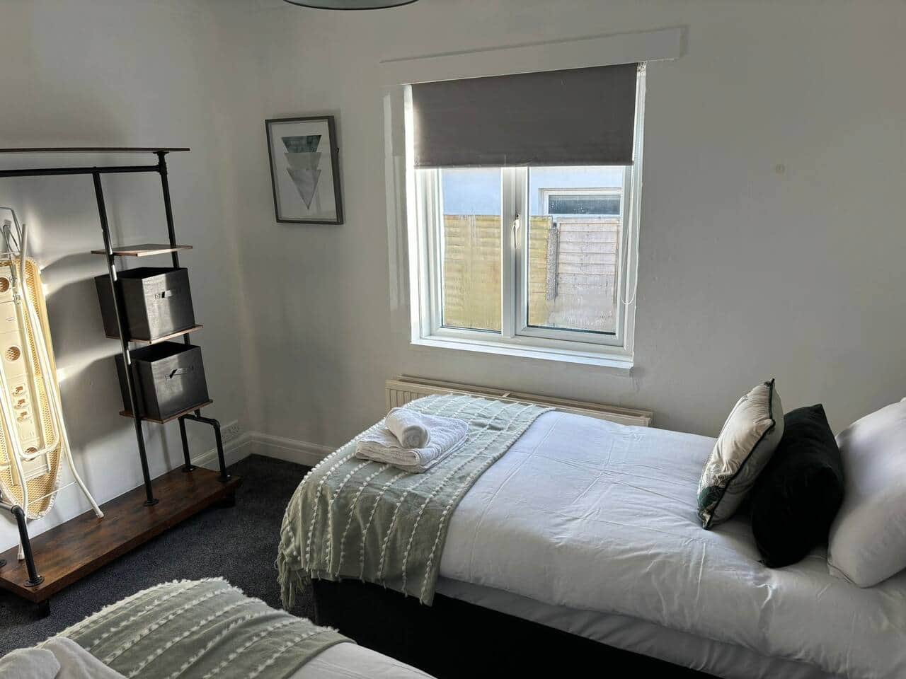 Unwind in our cozy and comfortable bedroom, perfect for a restful night's sleep. Book your stay now!