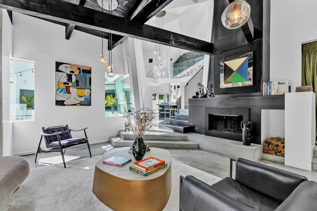 Our living room is a visual delight, thoughtfully designed to offer an open and inviting atmosphere.