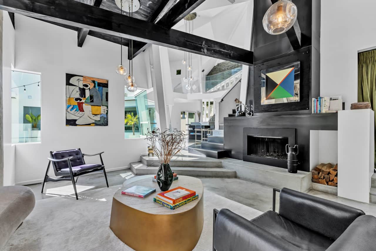 Our living room is a visual delight, thoughtfully designed to offer an open and inviting atmosphere.