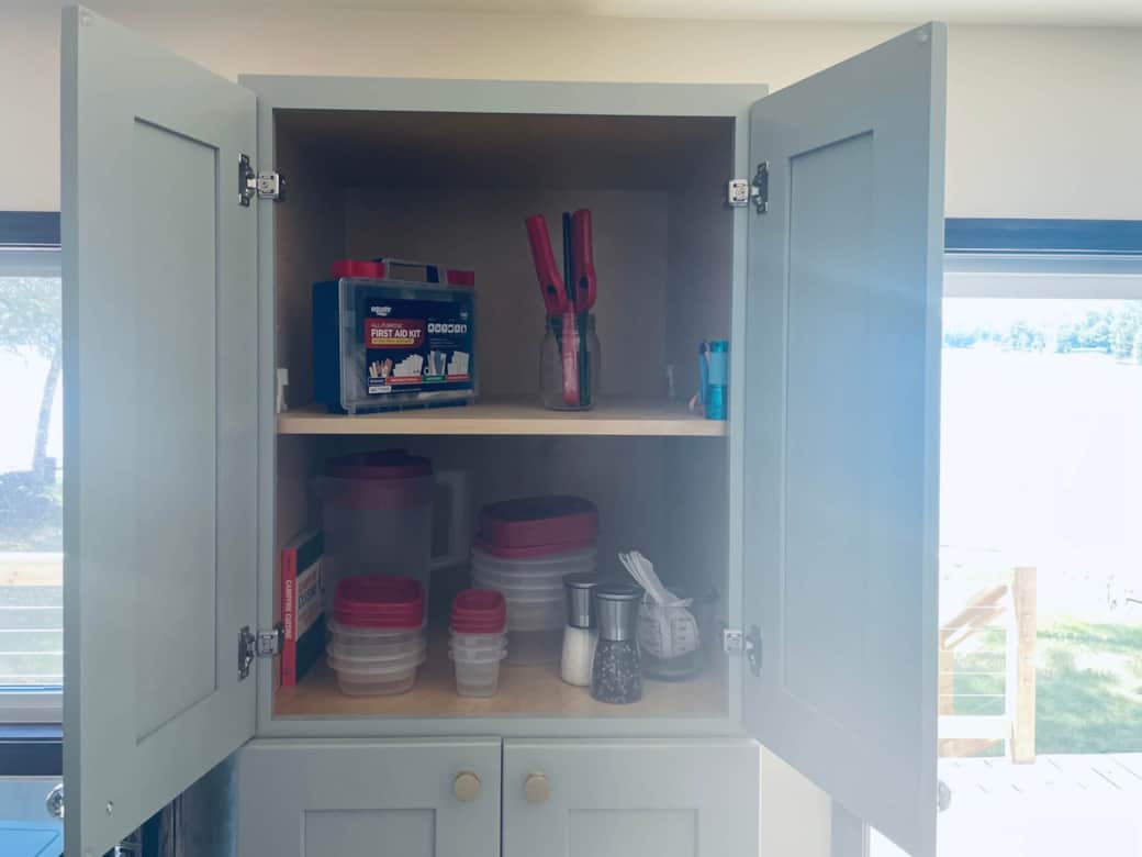 Food storage, measuring cups, salt and pepper, lighters, flashlights, and first aid