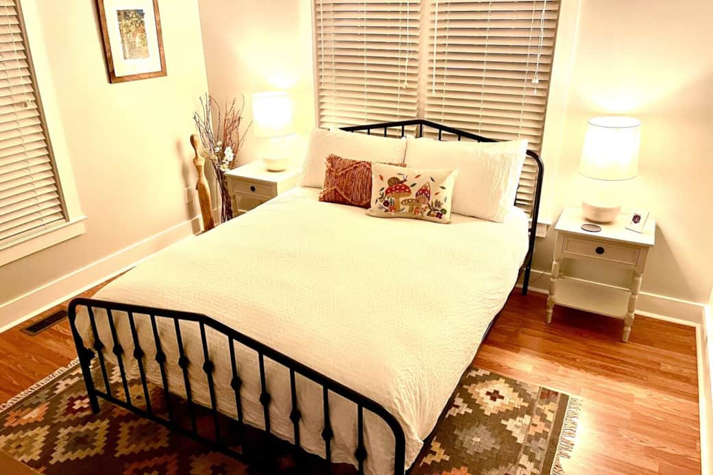 Enchanted!! Bedroom 1 with queen mattress, full closet and African 5 drawer dresser. Local artist ... adorns the walls. Enchanted!! Bedroom 1 with queen mattress, full closet and African 5 drawer dresser. Local artist ... adorns the walls.