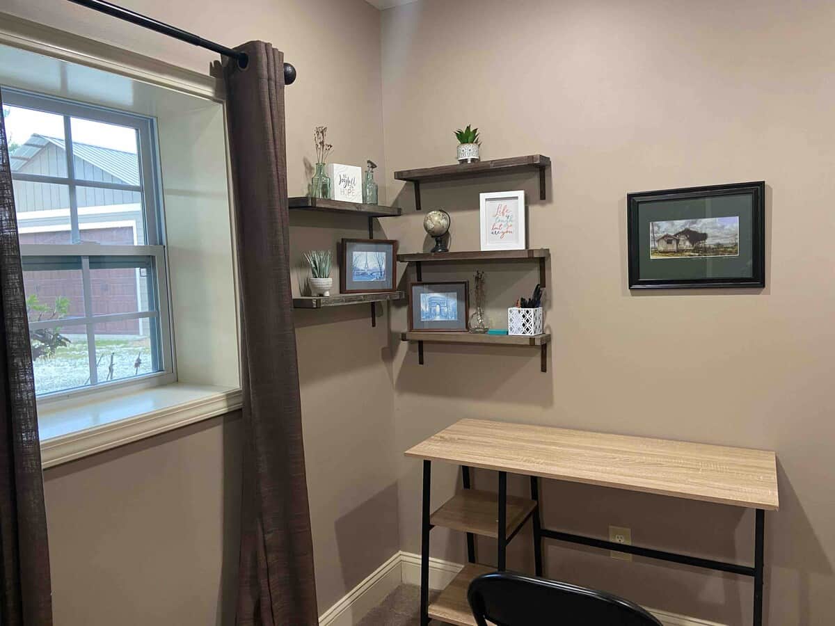 Designated office workspace located downstairs. 