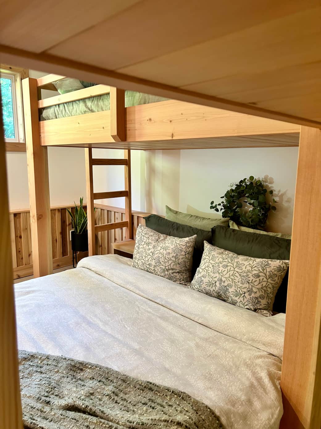 Custom Queen bed and Bunks all made from logs milled and finished on the property