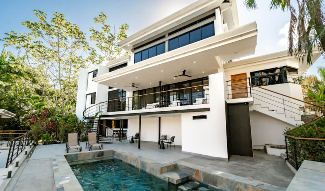 Multi-level modern villa with outdoor terraces and seamless indoor-outdoor living. Multi-level modern villa with outdoor terraces and seamless indoor-outdoor living.