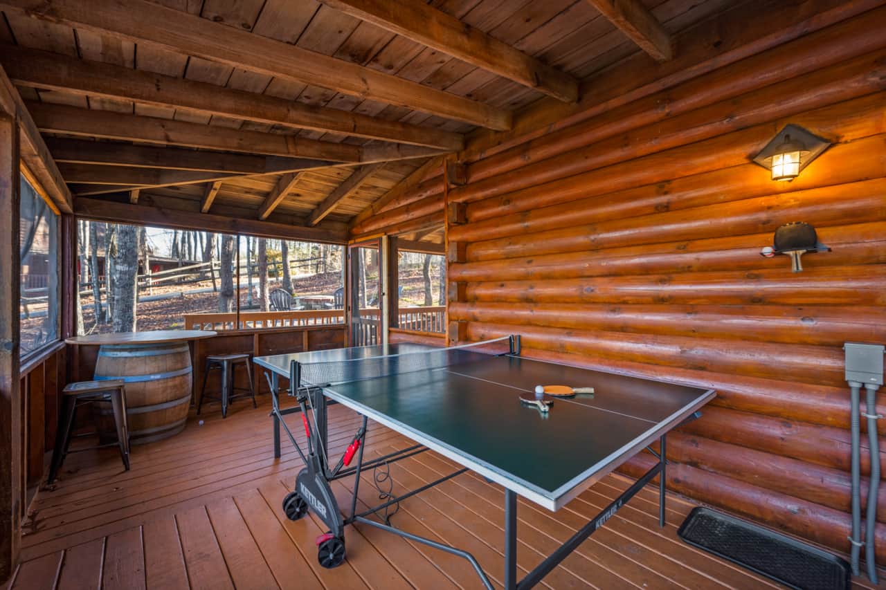 Challenge your friend to a ping pong game in the screened in porch