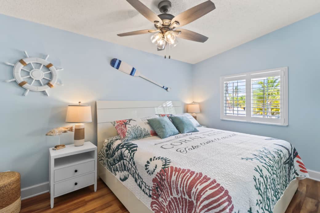 Master bedroom featuring a king-size bed with a JW Marriott mattress