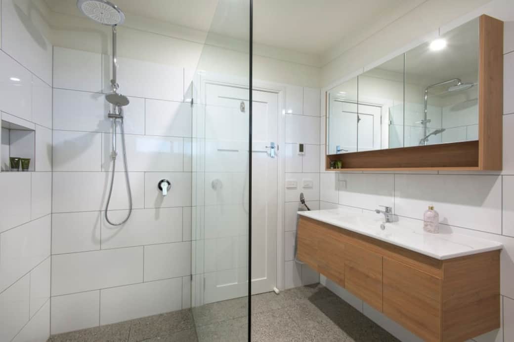 Towels, body wash, shampoo, hair fryer are all available in this modern bright clean bathroom. With heated floors for winter warmth.