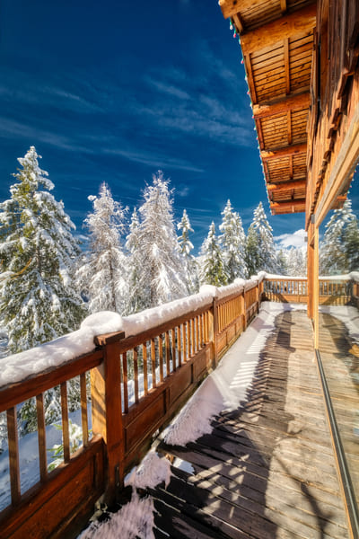 wood, stone, and glass mountain chalet