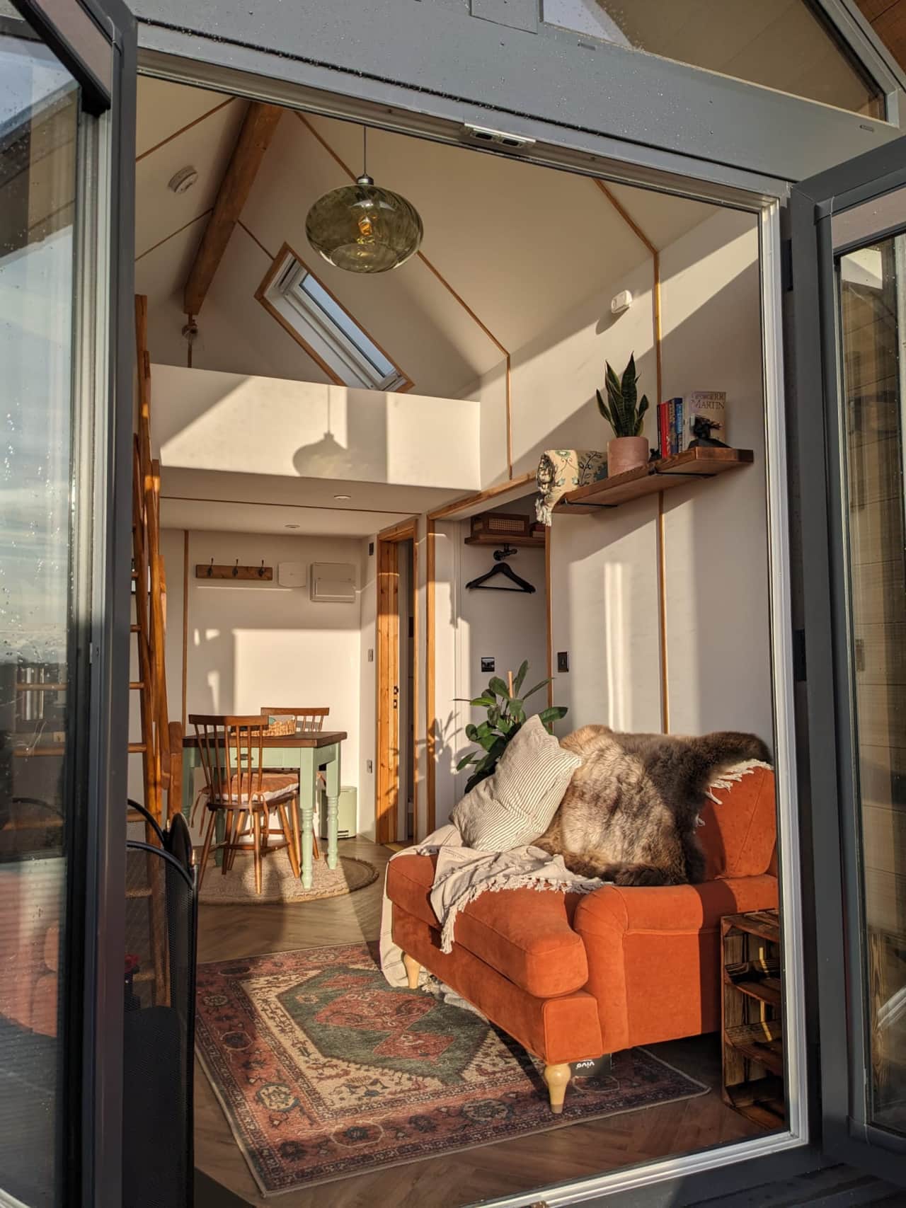 Kitchen/dining and cosy seating for fire-side reading/games