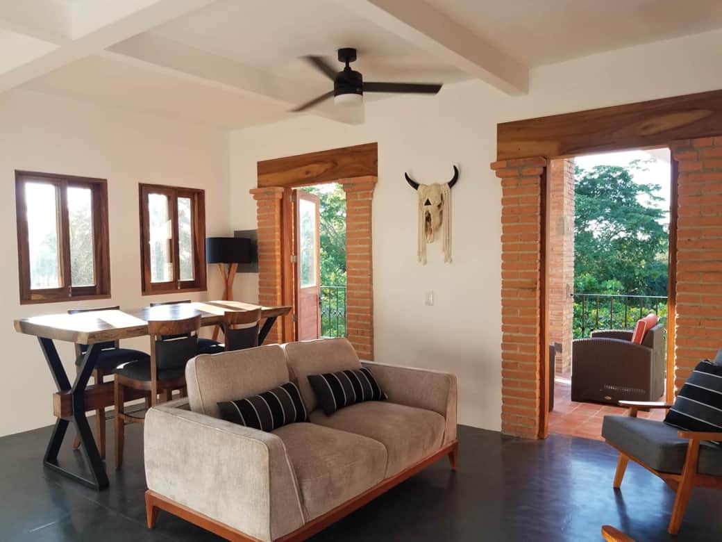 Living room opens up to patio seating