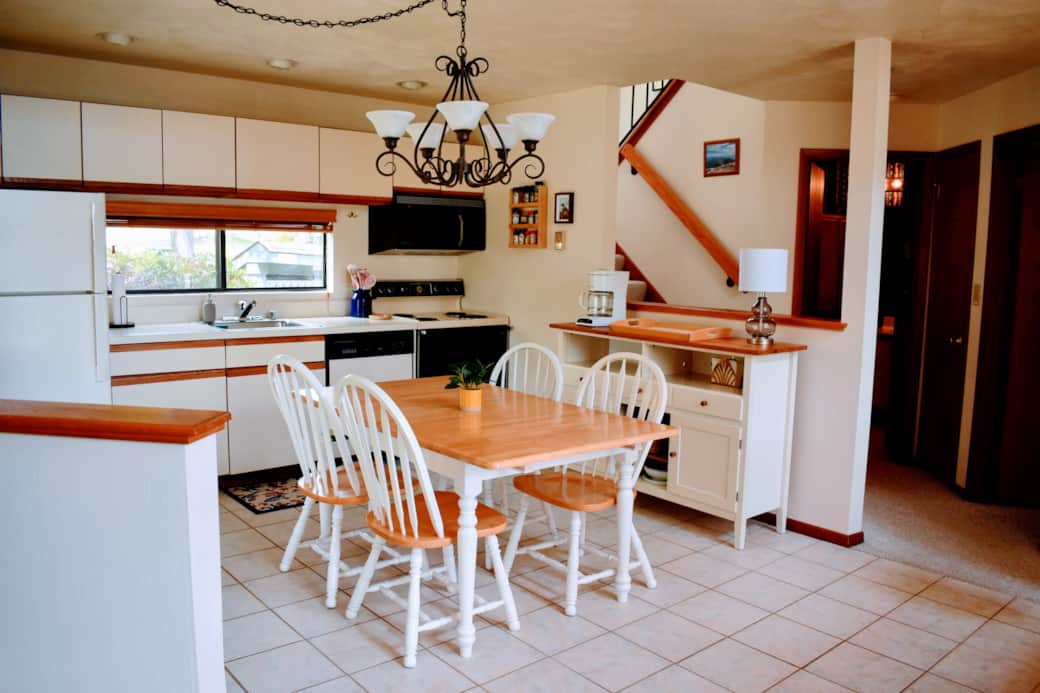 The kitchen and dining area are set for an easy at-home meal.
