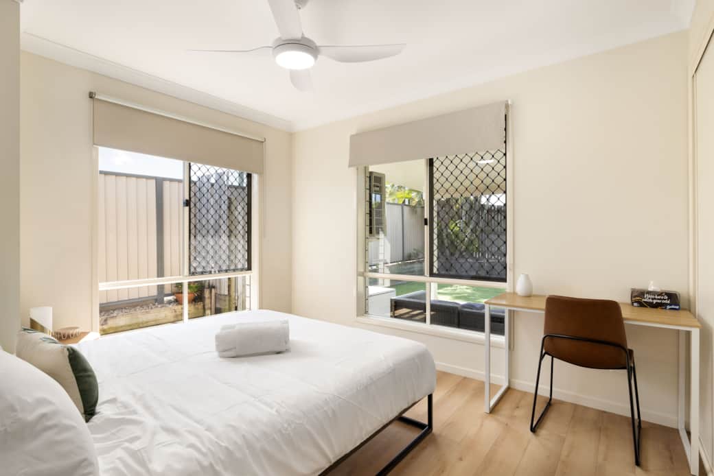 Bedroom 1: Peaceful bedroom with cozy design and ample storage