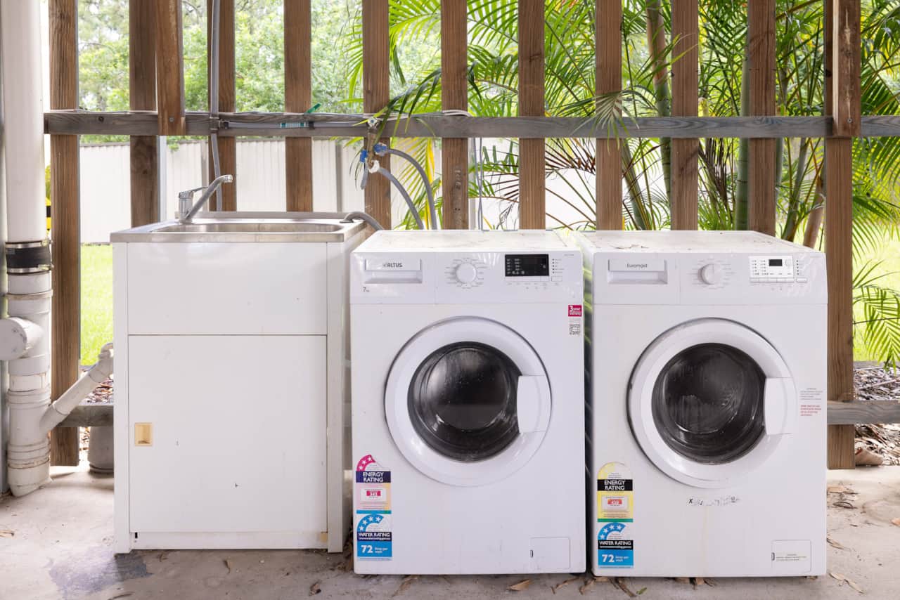 Shared Laundry Area: Washer available for convenient laundry needs 