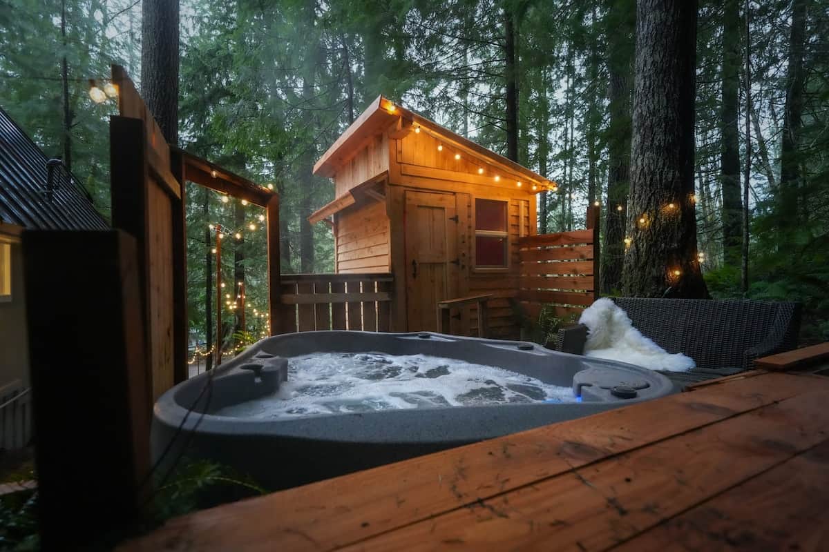 The woodland spa area boosts a 2-person hot tub and private sauna, which offer the perfect ways to relax after a long day of exploring at Mount Rainier National Park.  