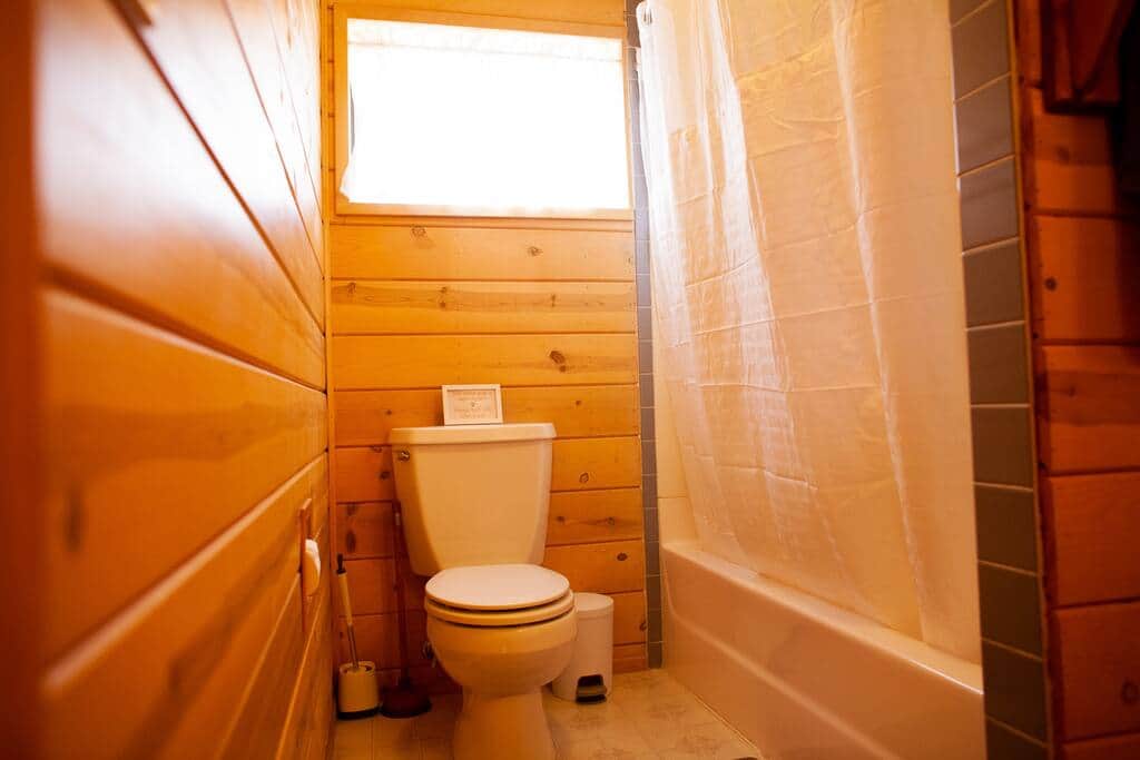 Downstairs full bath with bath tub. Downstairs full bath with bath tub.