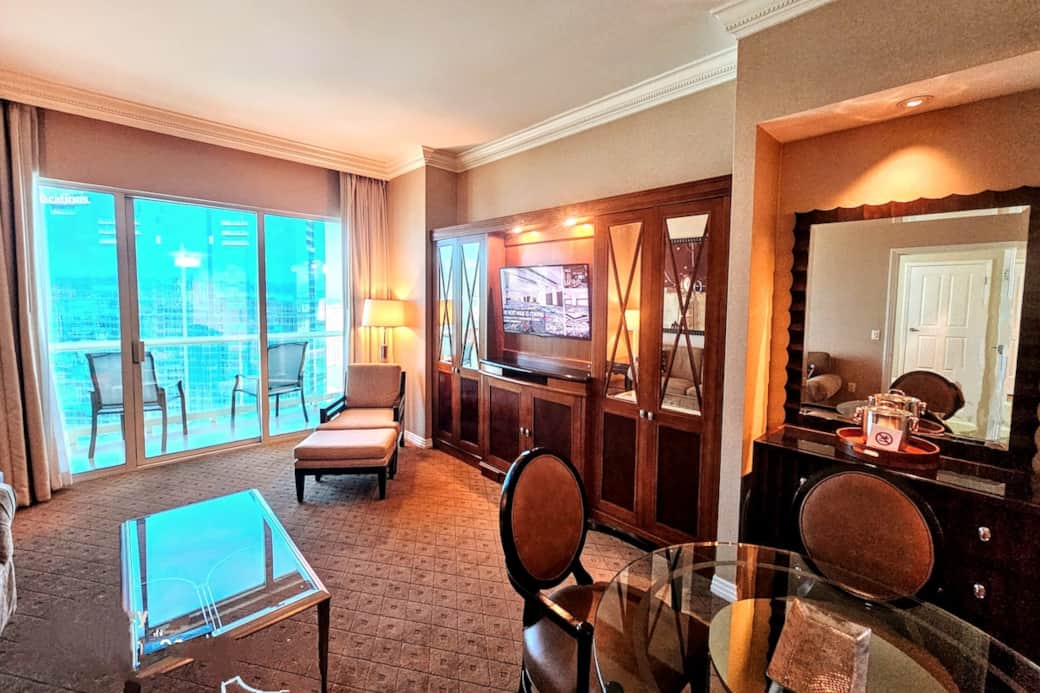 Living room and entertainment center.  Free wifi and Signature cable.  WIFI is open. Balcony views are fabulous!
