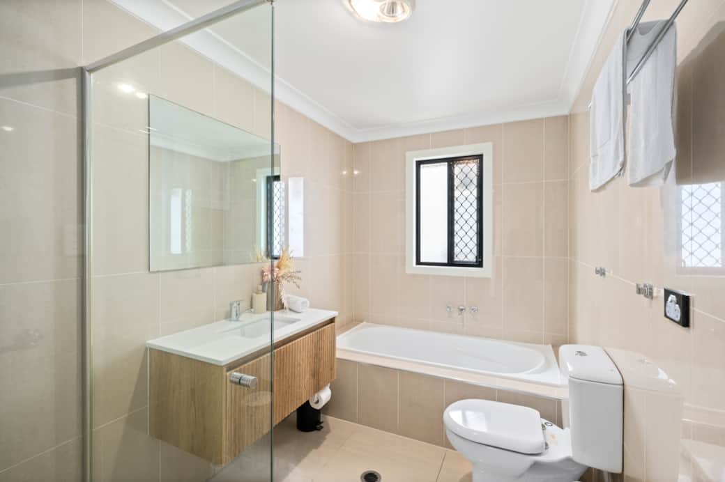 Bathroom: Clean, well-kept bathroom with bathtub included 