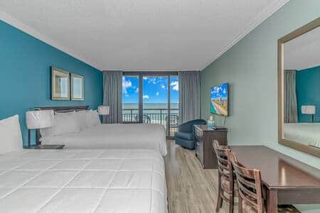 Two comfortable beds- King and Queen, with direct oceanfront views—wake up to sunrise over the Atlan