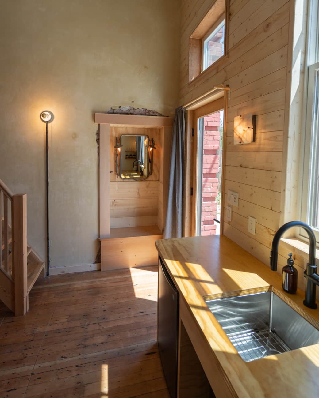 The custom entry bench and mirror