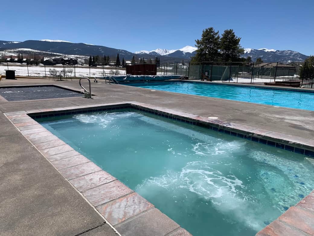 Access to Club MeadowRidge is included, with heated outdoor pool and hot tubs