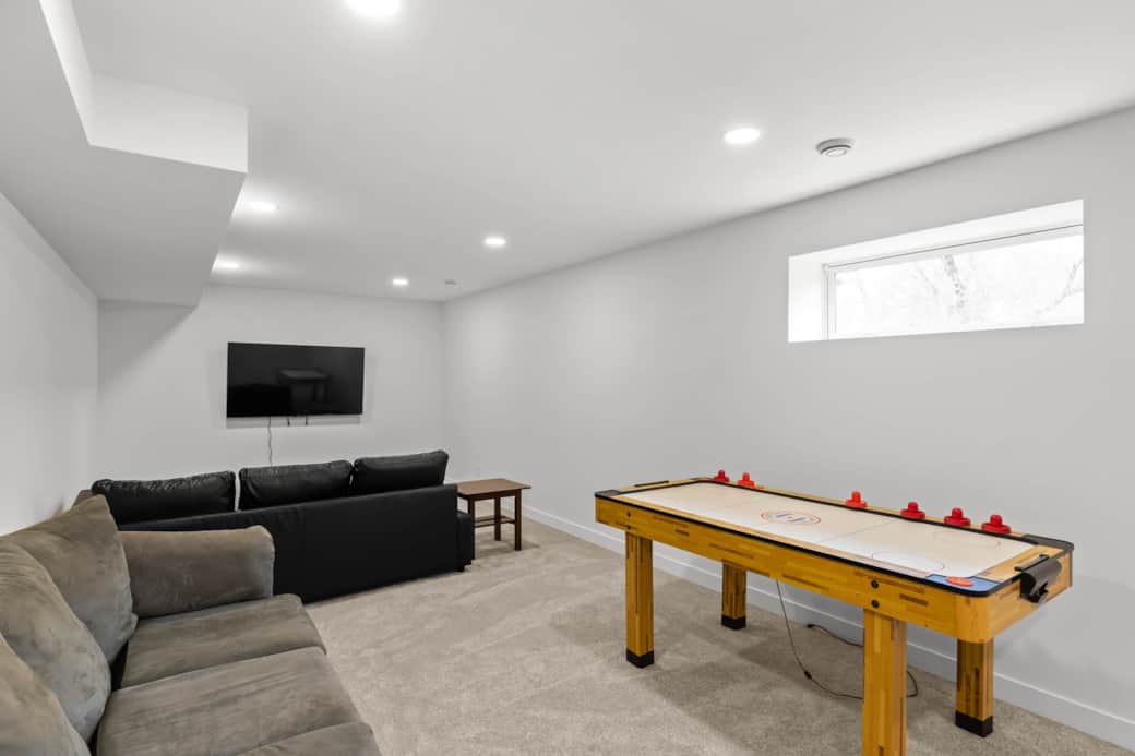 Air hockey and 65" tv