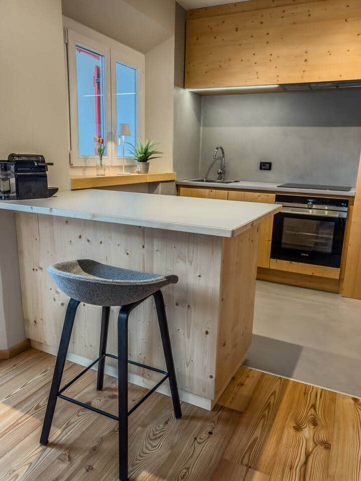Kitchen with espresso coffee machine, dishwasher, oven, microway