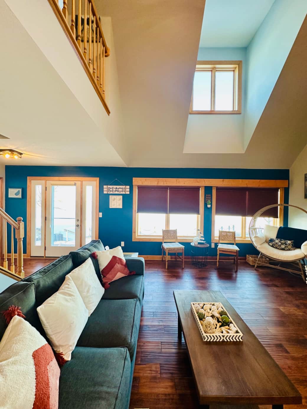 The heart of the home, offering views of the lake through large windows. The heart of the home, offering views of the lake through large windows.