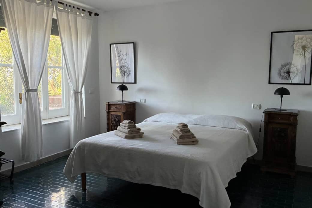 Casa Bougainville double bedroom with natural light in Gaeta