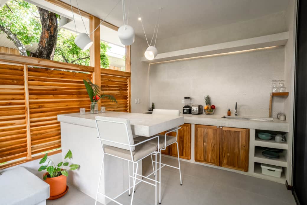 Outdoor dining space and kitchen