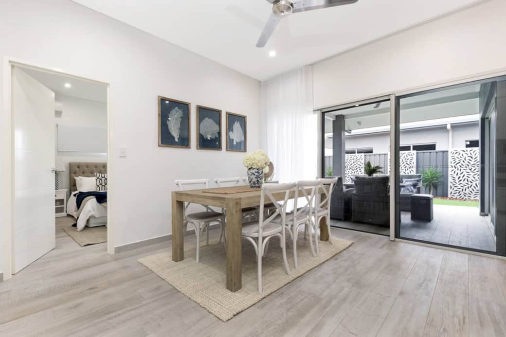 Bright, coastal-style dining area with seating for six—perfect for meals, laughs, and memories.