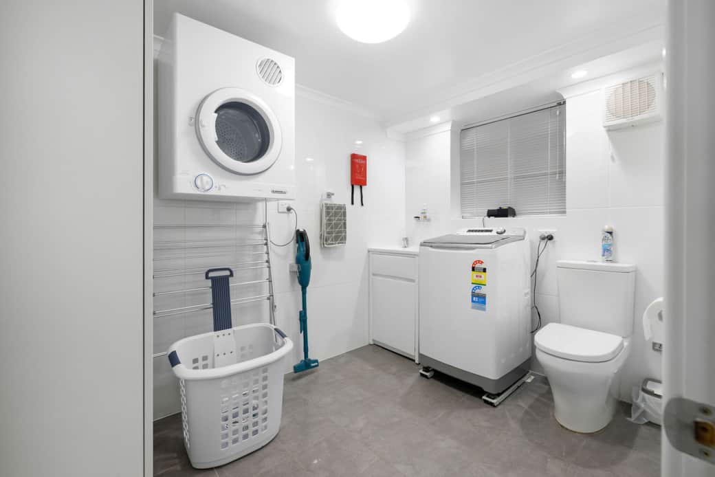 Laundry with the lot - includes a third toilet & a large private clothes line out the back.