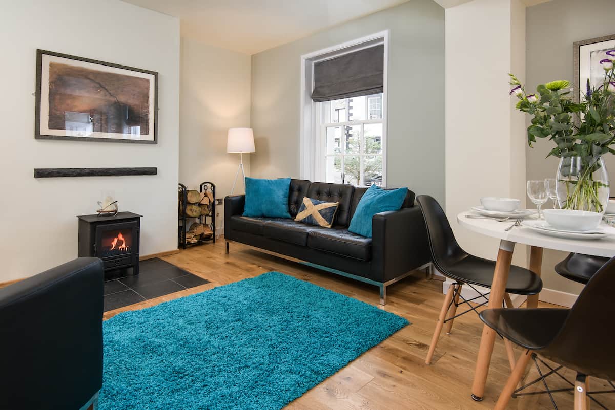 Warm and cosy living room with log burner