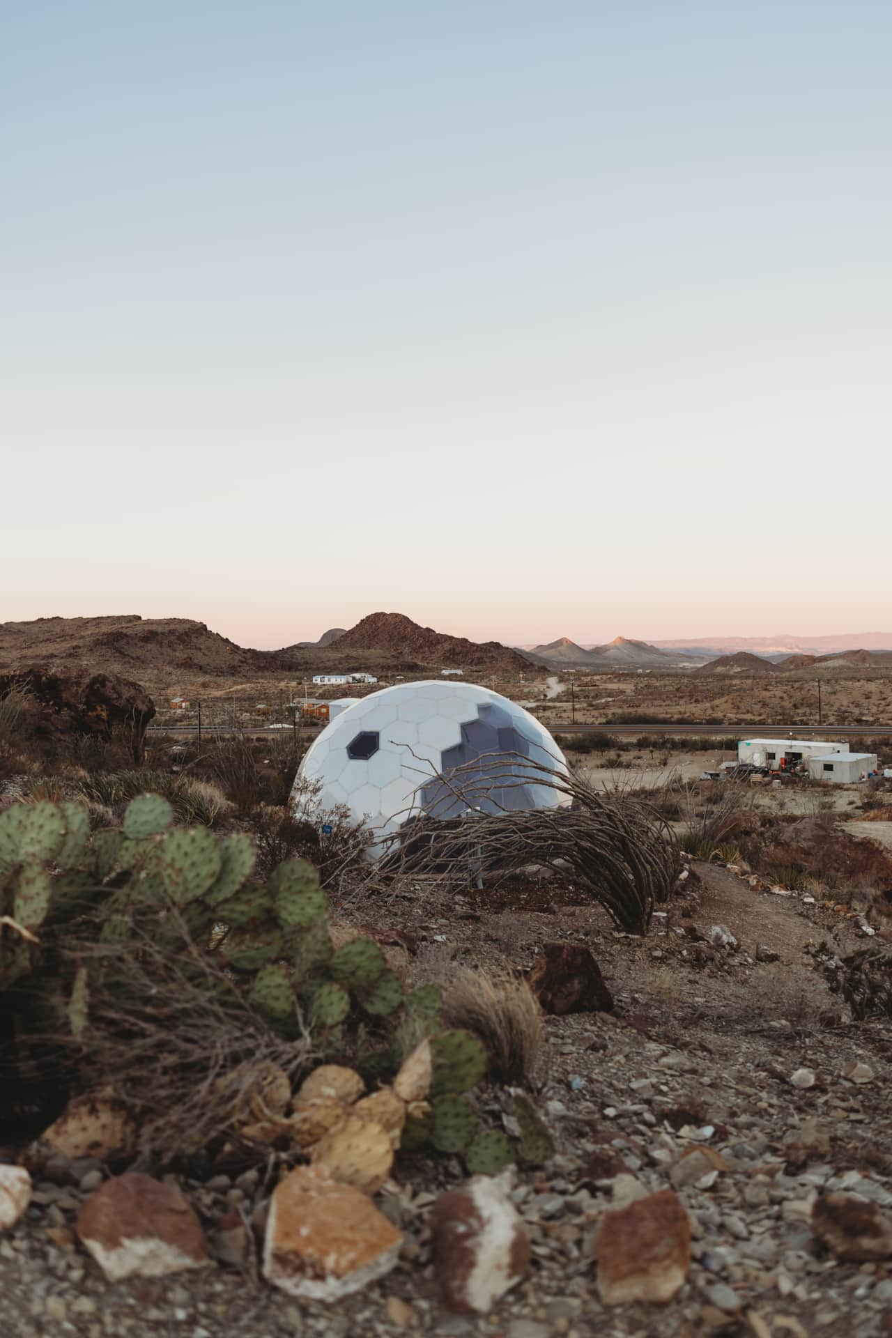 Space Pod 008 dome with Big Bend mountain views at dusk