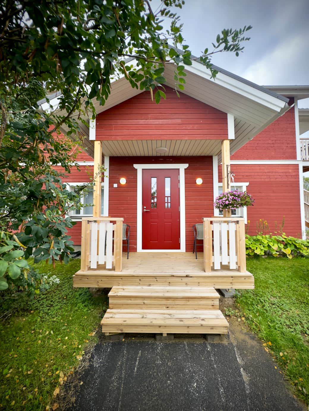 Entrance to the apartment is on the first floor on a two story house.