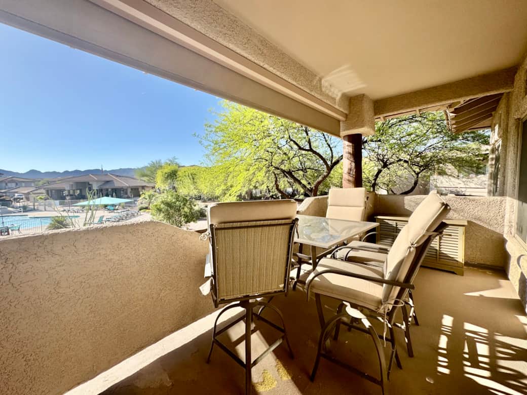 Large balcony overlooking the pool and spa Large balcony overlooking the pool and spa